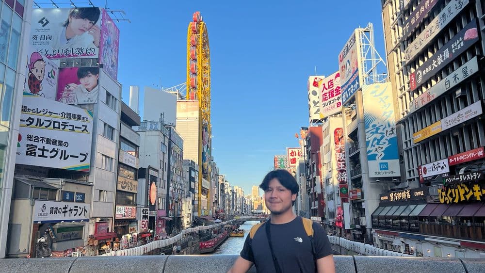 Esteban in Dōtonbori, Japan, having the trip of his life